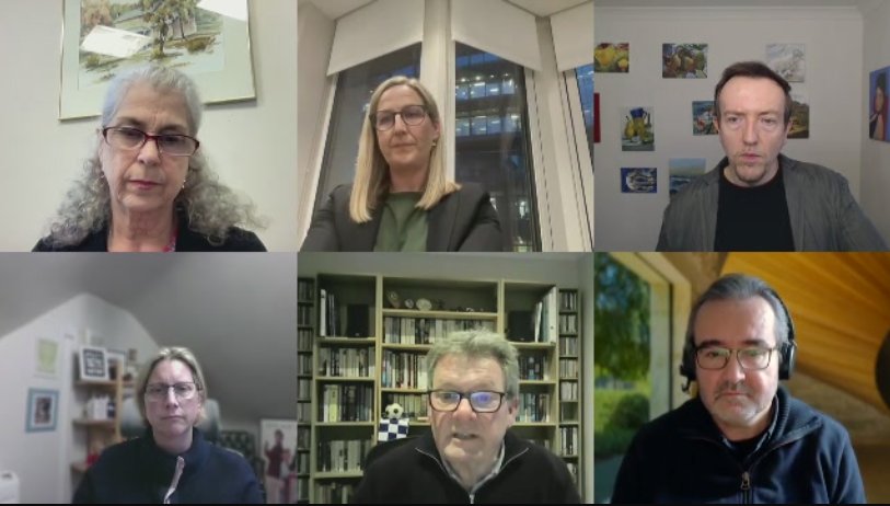 A virtual panel discussion with six participants in a grid layout, each in a separate video window. The top row features three individuals: a woman with gray hair, glasses, and a serious expression (Debra); a blonde woman wearing glasses, speaking with enthusiasm (Kat); and a man with short brown hair, wearing a dark blazer with artwork on the wall behind him (Neil). The bottom row includes: a woman with blonde hair and glasses, sitting in a home office (Emily); a man with glasses, in front of a bookshelf filled with books (Mark); and a man with dark hair, wearing headphones and a black sweater, with a window showing greenery behind him (Antonio).